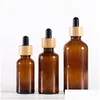 Bouteilles d'emballage en gros flacon compte-gouttes en verre ambré avec couvercles en bambou huiles essentielles flacons d'échantillon pour par liquides cosmétiques 15 ml 20 ml Ot6Ob