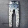 Mens Jeans Designer Amirrs Jeans Ny ljusfärg Personlig stänkfärgpunkt Kniv Knur Cut Hole Men's Fashion Märke Korean Slim Legged Pants Be8e