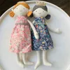 Dolls Boneka Kain desain Baru Mengenakan Gaun Bunga Yang Indah Lembut Dan Lutu Untuk Hadiah Anak Perempuan Teman Bermain Pendamping 230905
