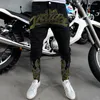 Jeans da uomo Luxury Black Stretch Skinny Hole Designer Pantaloni da moto di alta qualità Pantaloni a matita con strass in denim punk Y2k