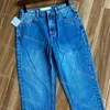 Jeans casual affusolati da donna con tasca in collage di pelle, jeans blu lavati a vita alta