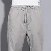 Męskie spodnie 2023 Wiosną Lato 97%bawełniane kostki mężczyźni zwykłe Slim Fit cienki solidny kolor szary marki spodnie Mężczyzna 28-38