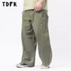 Mensbyxor Multipocket lastbyxor Mens Safari Style Solid Color Casual Pants Loose DrawString Wide Ben Pants Men byxor 230906