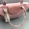 Słynne marki torebki kobiety W Haterproof Designer Torby na ramię torebka nylonowa torba na plażę designerstwo składane TOTE Bolsa sac feminina178m