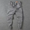 Pantaloni da uomo Moda Casual Sport Fitness Allenamento Pantaloni da corsa Vita elastica Tinta unita Coulisse Cargo Pantalones Hombre