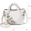 Factory wholesale women shoulder bags 8 elegant flower embroidery handbag daily Joker solid color leather bag this year's popular woven handbags 0626#