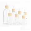 Bouteilles de stockage Bocaux 5-100 ml Tubes Compte-gouttes transparents Liquide en verre pour pipette essentielle Couvercle de grain de bois rechargeable Livraison directe Dheq9