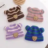 Berretti Berretto da bambino a righe lavorato a maglia carino Orso di cartone animato coreano Cappello da neonato con orecchie Berretto da cofano per bambina caldo all'aperto