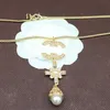 Collana classica placcata in oro Moda grande ciondolo con perla Regalo di nozze Gioielli Collane maglione di alta qualità 16 stile