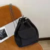 Sac à dos sacs à dos décontractés solide noir femmes Simple Version coréenne chaînes à cordes unisexe bureau dame sac seau tout-match Kawaii