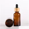 Förpackningsflaskor Partihandel Amber Glass Droper Bottle With Bamboo Lids Essential Oils Prov Injektionsflaskor för per kosmetiska vätskor 15 ml 20 ml Ottad