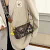 Borse da sera 2023 Designer di moda di lusso per le donne Borsa portapenne stampata Borsa versatile a banda larga con tracolla carina Vendita