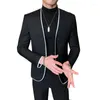 Costumes pour hommes Costume européen pour hommes Hit Couleur Split Joint Noir Blazer Hombre Casual Chaquetas De Vestir Costumes de scène pour chanteurs