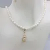 Choker Trendy Jewelry Alloy Chain Natural Sea Snail Shell Shell Freshwater Pearl Kort dingle Halsband Design för Women Acessories Gift