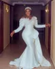 Arabic Aso Ebi Ivory Mermaid Wedding Dresses 2023 peplum Lace Pearls Beaded Crystals Sexy long sleeve Bridal Gowns plus size