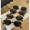 El diseñador de gafas de sol compartir para ser pareja gafas de sol para hombres para mujeres, la marca de lujo CE arco de triomphe de moda femenina metal de moda para hombres ovales de borde ancho pierna de borde ancho