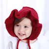 M651 Nouveau automne hiver infantile bébé filles tricoté seau chapeau enfants casquettes volants princesse enfants chaud coupe-vent oreille Protection à lacets chapeaux