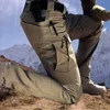 Pantalons pour hommes Militaire Tactique Hommes Pantalon de Combat Spécial Multi poche Imperméable Résistant à l'usure Salopette d'entraînement décontractée 230906