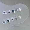 Falska naglar handgjorda korsa kortpressar på nagel fullt omslag bärbar hjärta pärla manikyr dekoration falsk design för flickor