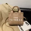 Mini tote feminino 2023 nova tendência moda bolsa júnior de alta qualidade crossbody saco code11