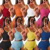 Femmes T-shirt de couleur unie Survêtements Designer Shorts d'été Tenues de yoga Costumes de jogging décontractés avec rides et corde à nouer sur les shorts2402