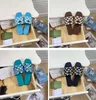 Pantoufles de créateurs pour femmes en métal décontracté en cuir à fond plat sandales à bouche de poisson sandales de mode classique avec boîte