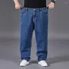 Jeans masculinos plus size 46 48 50 solto elástico cintura alta tubo reto calças de grandes dimensões lazer profunda virilha obesidade