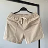 Mäns shorts män avslappnad kort sommar 3 del längd elastisk midja modekläder dragskon streetwear grundtyp fast färg