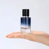 Recipiente cosmético recarregável portátil do frasco de perfume da cor do inclinação do cilindro vazio de 30ml 50ml com tampa do pulverizador