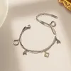 Moda classica placcato oro 18 carati traforato presbiteriano quadrifoglio braccialetto gioielli firmati donne eleganti acciaio al titanio gioielli colorfast mano19 GBP3