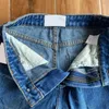 Jeans casual affusolati da donna con tasca in collage di pelle, jeans blu lavati a vita alta