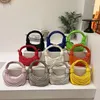 Kvällspåsar 2023 Solid Color Fashion Personality Summer Women's Messenger Bag Wire Bundle flätad knuten axel