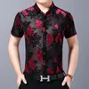 القمصان غير الرسمية للرجال مثيرة قميص شفاف رجال زهرة طباعة نادي المخملية Chemise Homme 2024 Spring Mannen Kleding Short Slim Fit