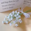 Dekorativa blommor virkade tusensköna lily gren handgjorda stickade för bröllop sovrum lärar dag gåva skrivbord prydnadsrum dekor