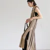 Casual klänningar japanska stickade långklänningar streetwear ärmlös ihålig rygglös kvinnor snörning randig delad mode strandrock t214