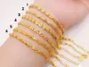 Charm armband guldpläterad fyrblad klöver persika hjärtarmband kvinnlig imitation Vietnam hårda falska juvelersmall gör inte någon