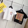 Summer Children Short Sleeve Letter Tees Luxury Brand Cartoon Co Märke Fashion Style Small and Medium Girls Top T-shirt Barnkläder