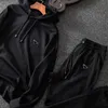 Męskie dresy ślady dresy bluzy bluzy i spodnie Designer TrackSuits Skoczki Sprężyny jesienny dres z literami Bug Black B J230907