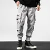 Herrbyxor mode mens hi-street last man lösa japanska streetwear hiphop pocket byxor av hög kvalitet joggar för man