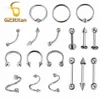 LABRET LIP PIERANIE Biżuter 10pc Lot Hurtowa G23 Podstawowe pierścienie ciała Pierścienie Uło Stuki brwi nos nos Septum General Bar Barbell 230906