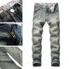 Jeans pour hommes déchirés minces petits pieds beaux hommes style coréen vieux pantalon de personnalité rétro