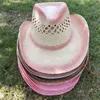 Breda brimhattar hink rosa ihåliga väv cowboy hatt stråstjärna jazz panama papper gräs västra denim mode rese grossist 230907