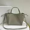 Luxo Bolsa de designer de vendas a quente de cordão de cordão em bronzeado de pele de bezerro para mulheres A bolsa pode transportar a mão no ombro transportar carry carry