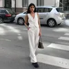 Pantalon de deux pièces pour femmes Boho inspiré élégant pantalon blanc ensembles femmes 2 pièces correspondant ensemble bureau d'été col en v sexy hauts sans manches et