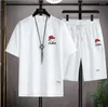 メンズトラックスーツ2023夏のスポーティでハンサムボーイズセットファッションシンルースショーツショートスリーブTシャツクイック乾燥スタイル