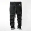 Herrenjeans Koreanische Version von Slim Foot Trend Wild Brand 2023 Herbst und Winter zerrissen