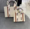 Дизайнерская сумка Женская сумка WOODY Tote Сумка для покупок Сумка из нейлона Hobo Модная льняная большая пляжная сумка Роскошная дизайнерская дорожная сумка через плечо Кошелек Letter BagA