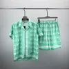 23 moda estiva Tute da uomo Pantaloni da spiaggia Hawaii set camicie firmate stampa camicia per il tempo libero uomo slim fit il consiglio di amministrazione manica corta spiagge corte 001