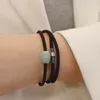 Braccialetti con ciondoli Bracciale intrecciato in argento sterling S925 Cera d'api naturale Smeraldo Fibbia di sicurezza Doppio anello Uomini e donne Coppie Gioielli