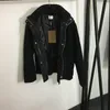 Capispalla di design addensato invernale Giacche classiche da donna con cerniera Cappotto con fascino di personalità nera Giacca di marca natalizia